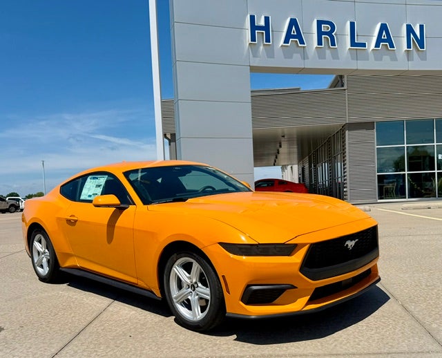 2026 Ford Mustang EcoBoost Fastback in Orange Fury Metallic Tri-Coat — front three-quarter view