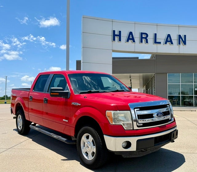 2014 Ford F-150 4WD SuperCrew 6-1/2 Ft Box XLT in Vermillion Red — front three-quarter view